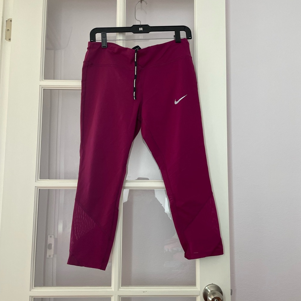 Pink cropped Nike leggings